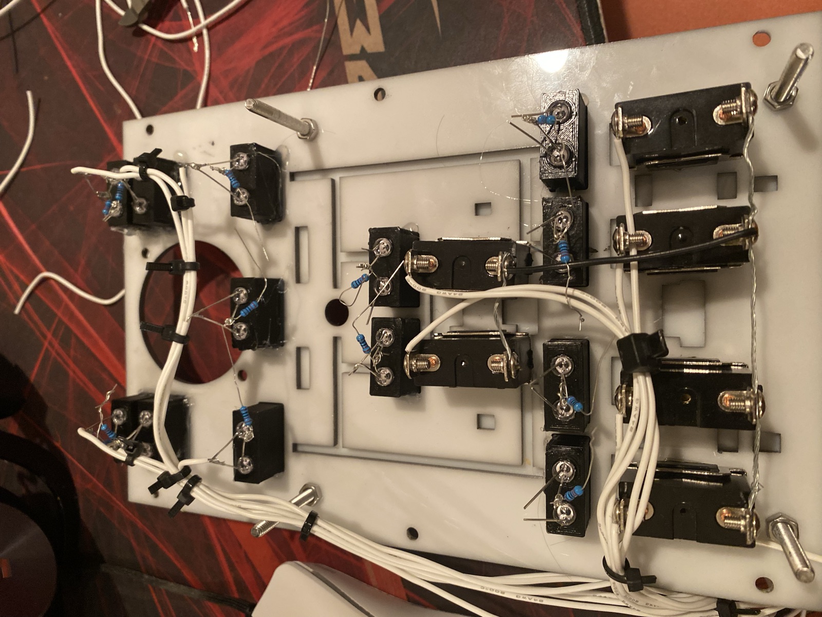 Back side of the fuel pump panel with hand soldered switches and resistors