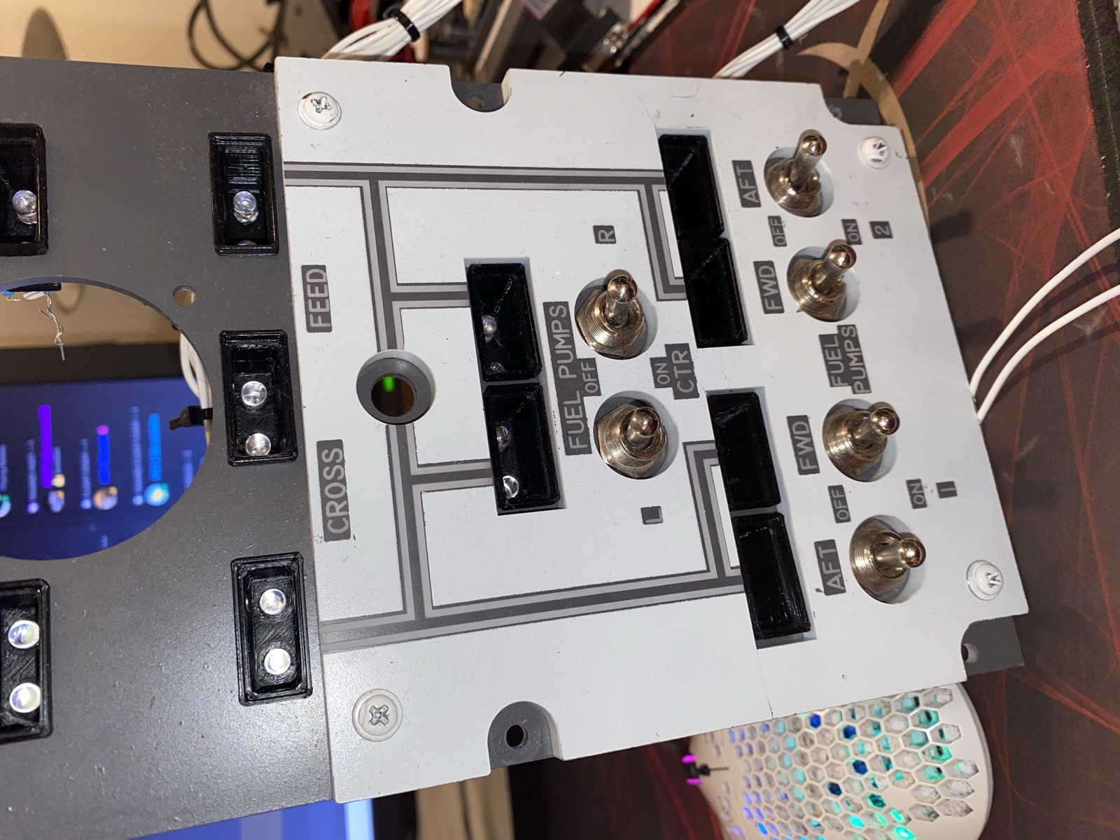 Wiring routed across the back of the fuel pump panel