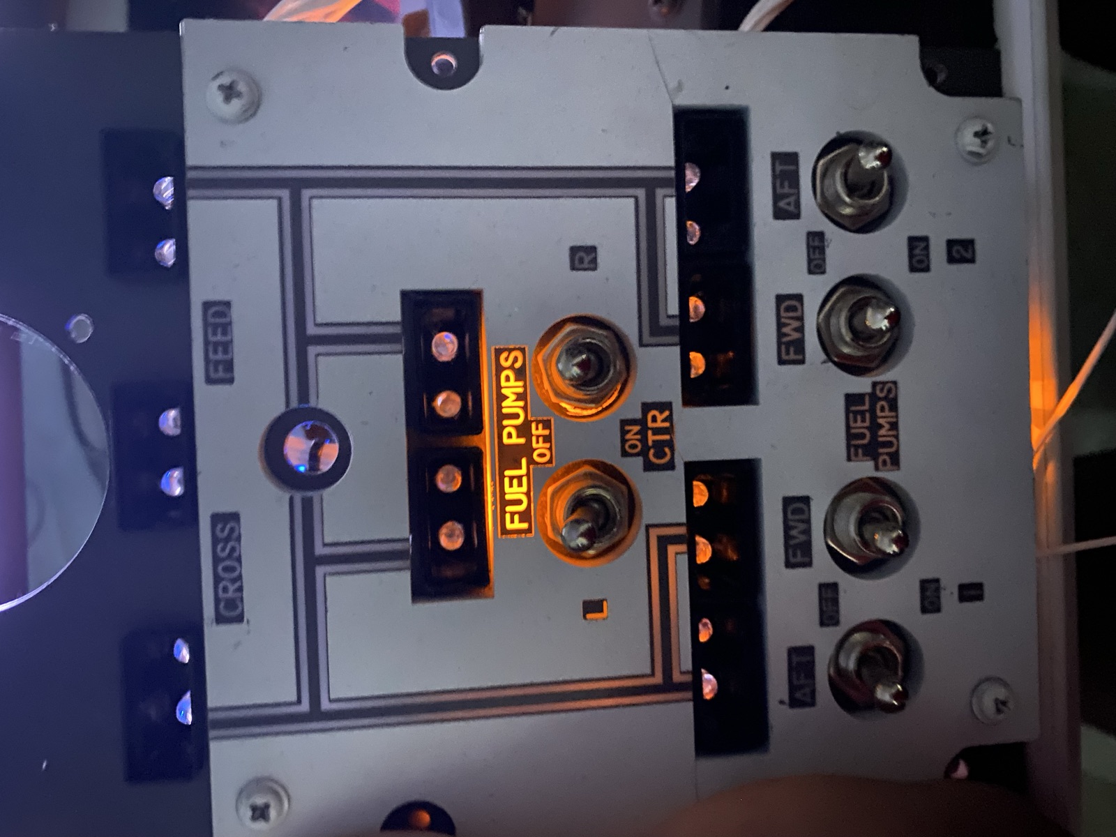 Close view of soldered switch terminals on the fuel pump panel