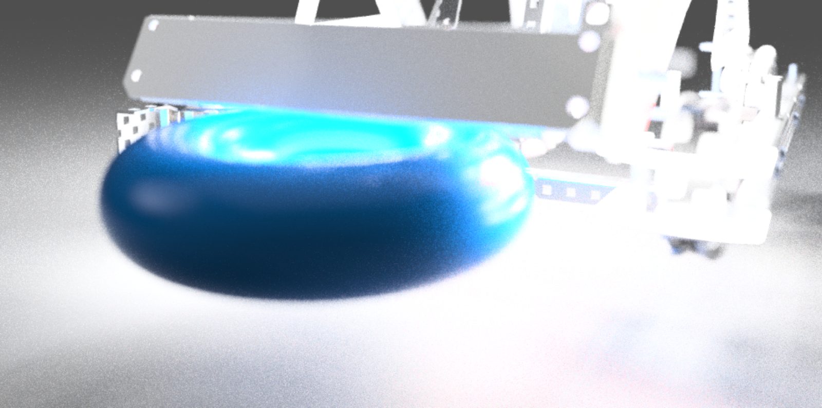 Close CAD render of the raised arm holding a ring at scoring height