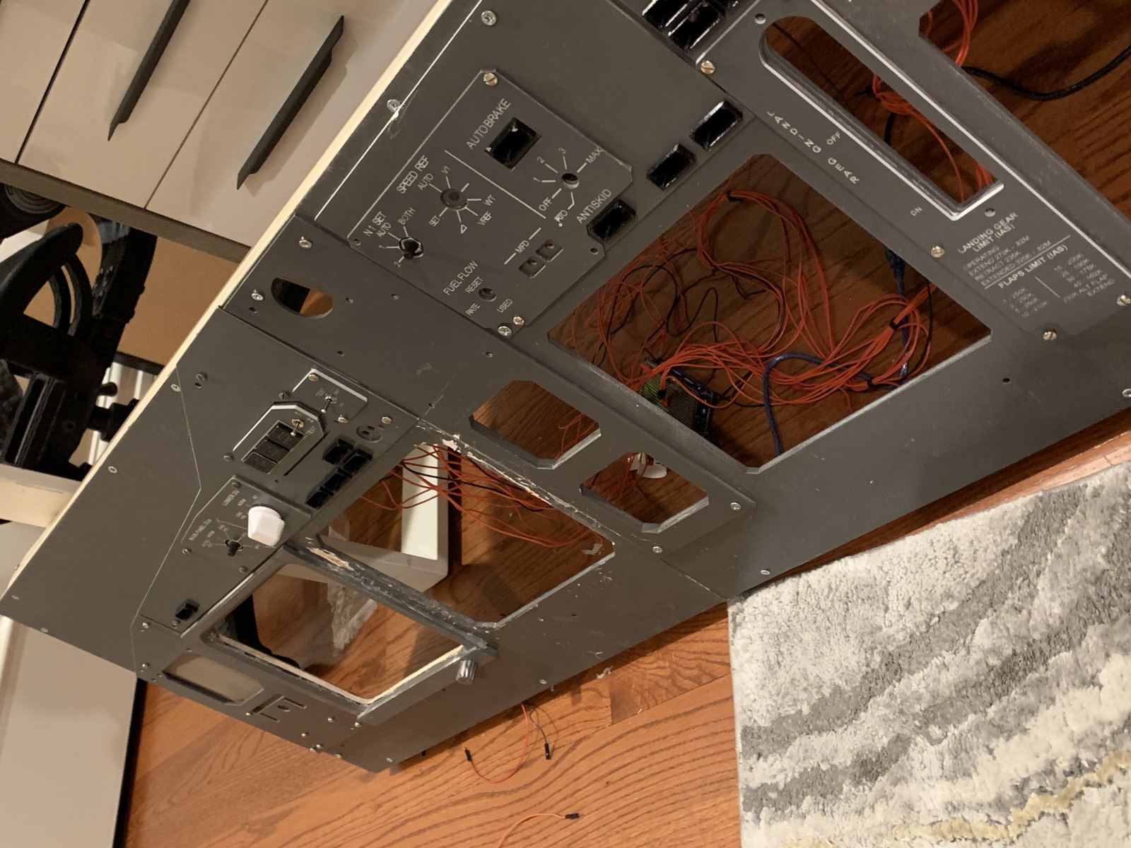 Assembled main instrument panel standing in the cockpit frame with control sub panels fitted