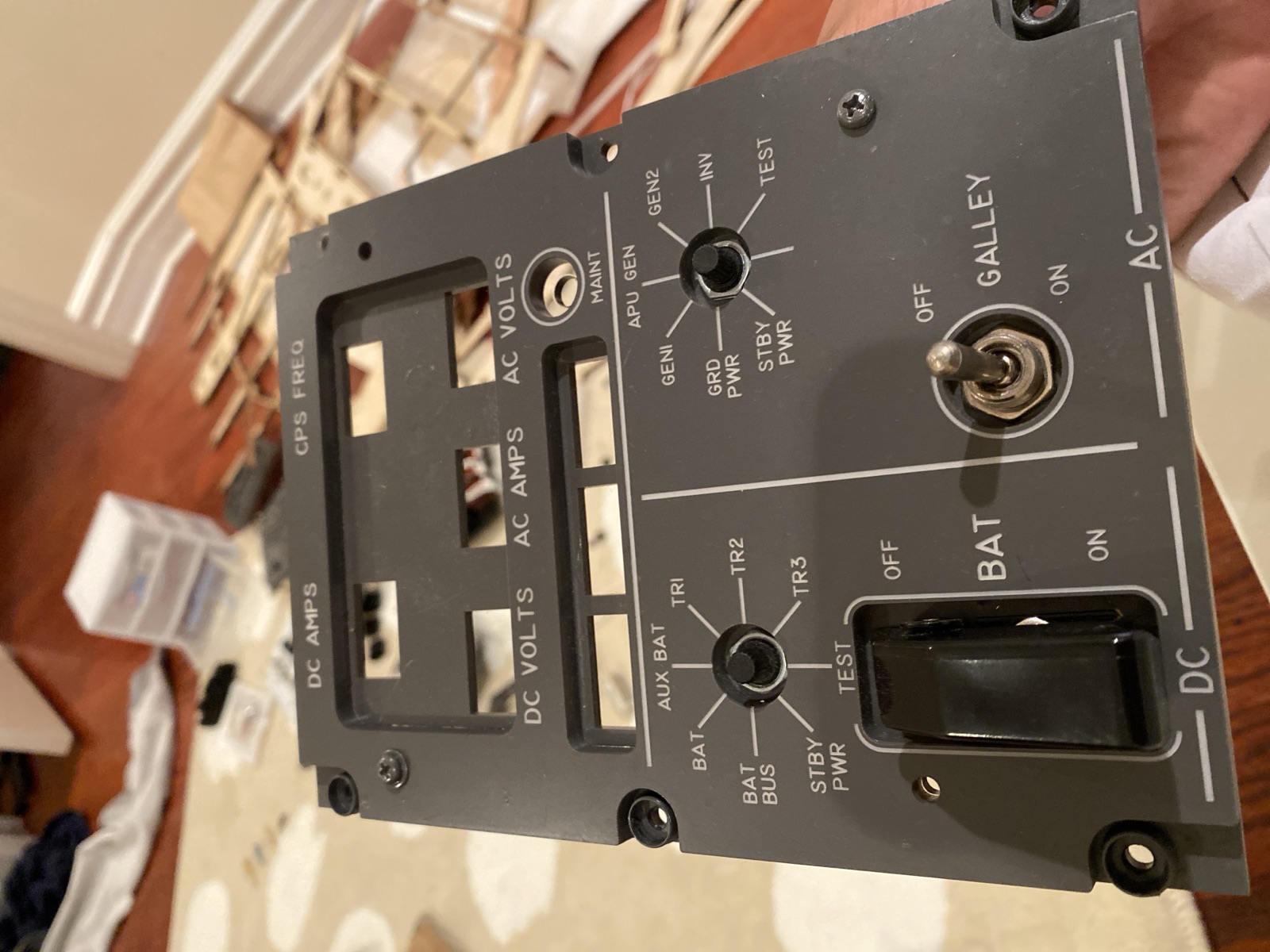 Finished electrical panel held up during the build