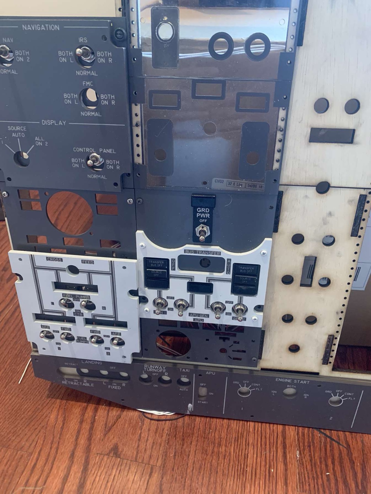 Overhead panels mounted together showing navigation and switch sections