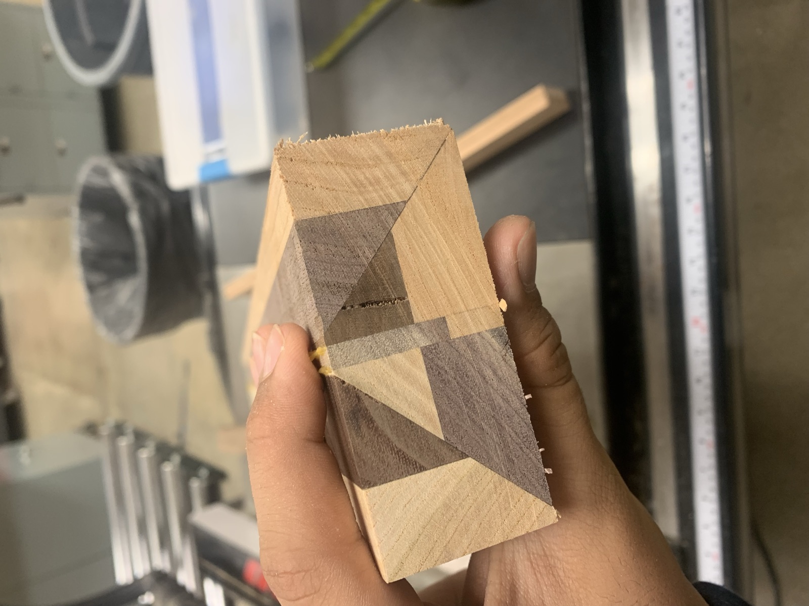 End grain cutting board with a geometric mosaic pattern