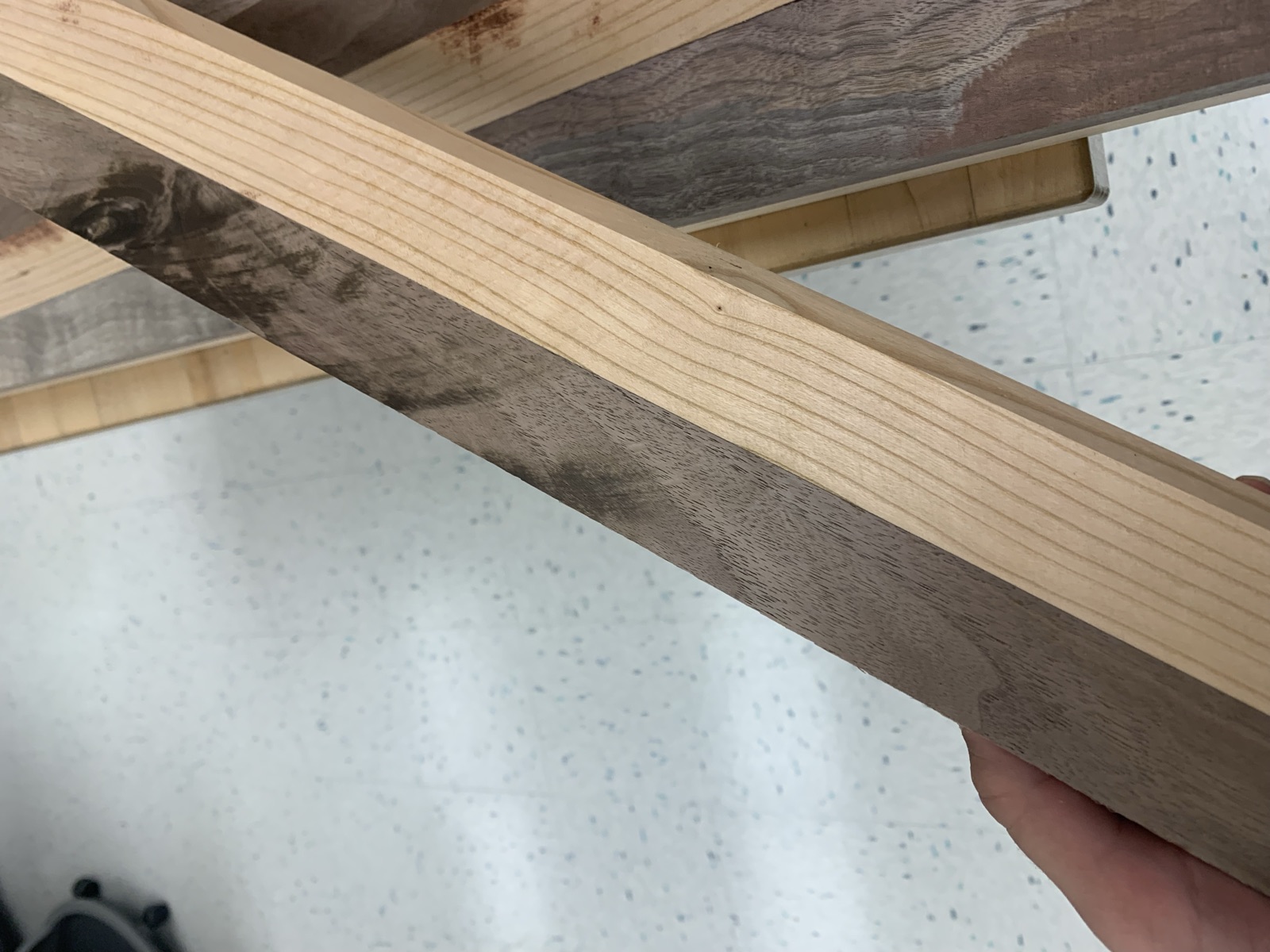 Cutting board strips clamped during glue up with the zig zag pattern in the end grain